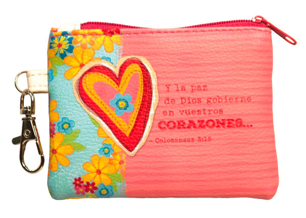 Coin purse is 3" x 4" with colored zipper, key, and lobster clasp. Carry your change in style in these clip-on coin purses. A convenient accessory to keep loose change all together and brighten up your day. Front and back features full color print. Features Spanish inspirational phrase. Material: PU.